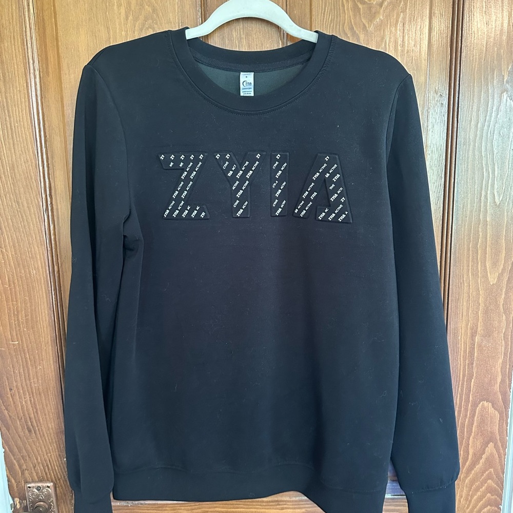 ZYIA Black Crewneck Sweatshirt with Embossed Logo Detail